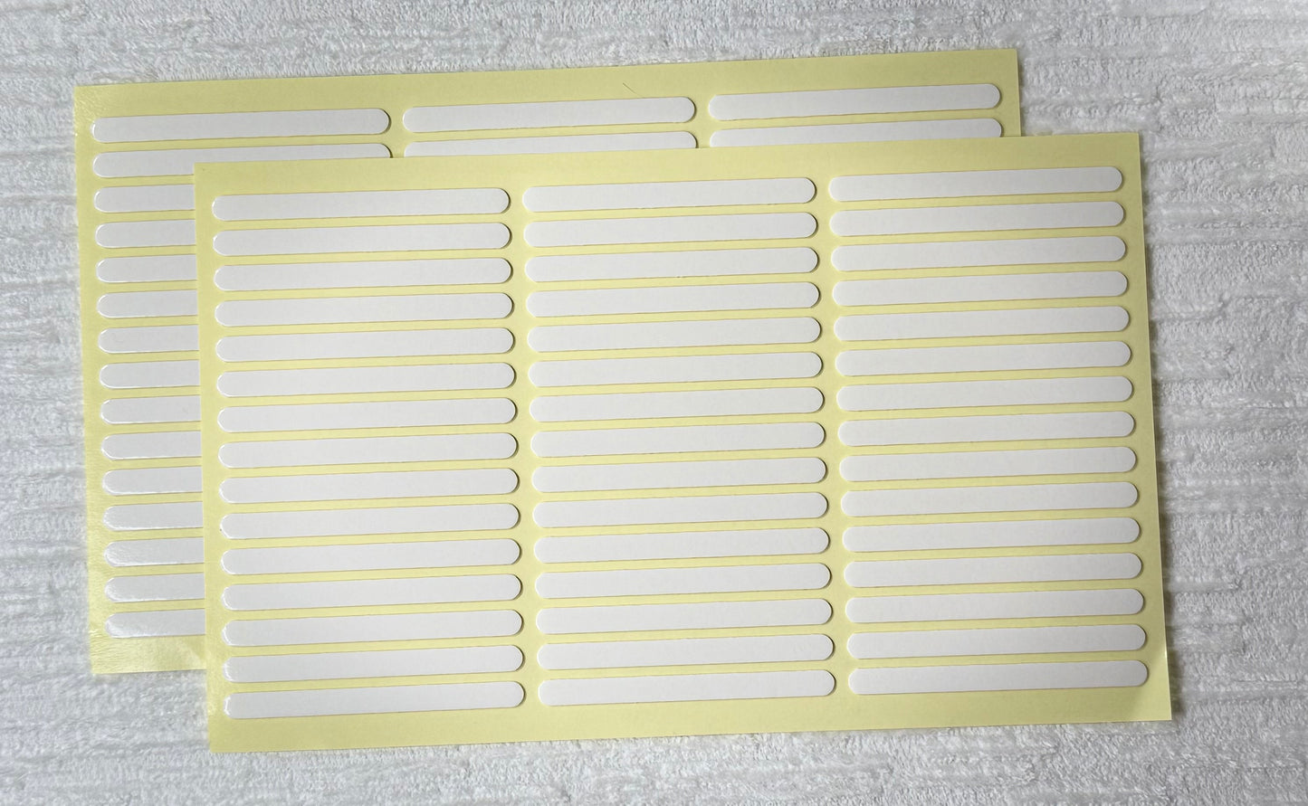 Pre cut double sided tape strips
