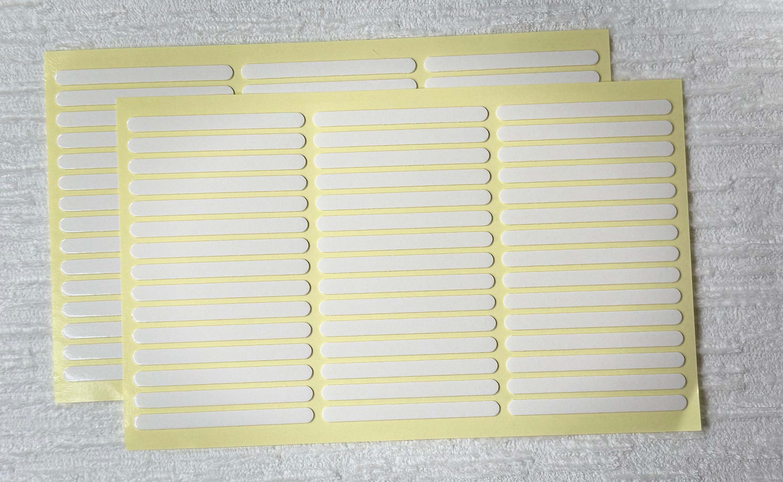Pre cut double sided tape strips